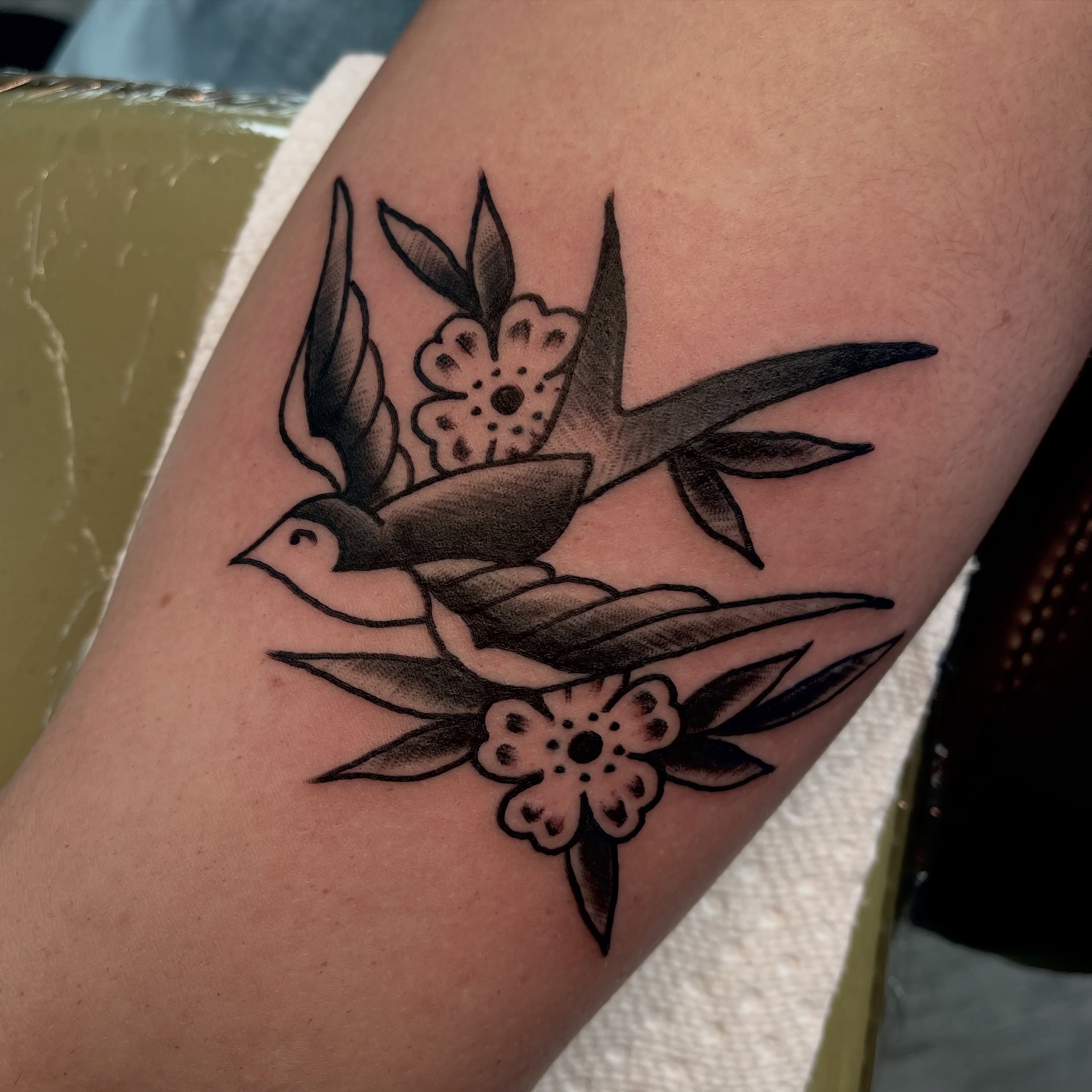 Swallow and blossoms