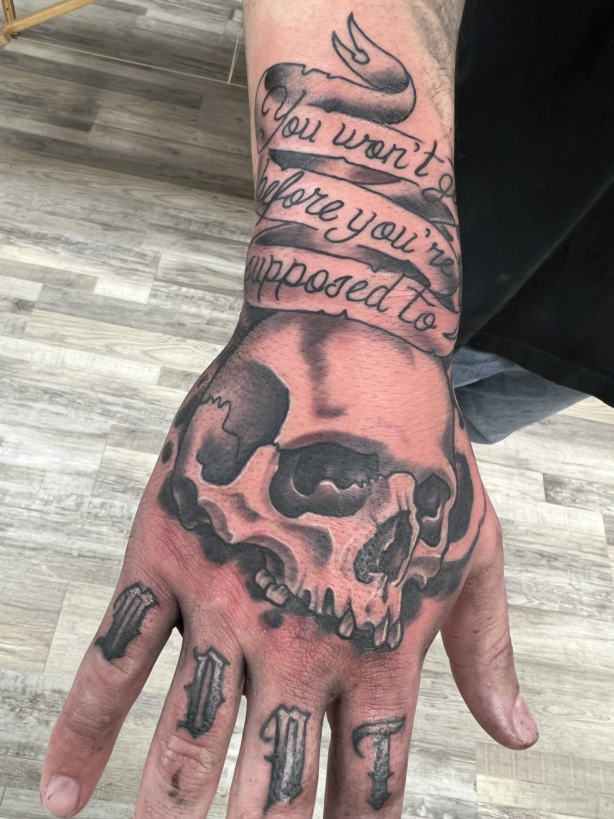 Skull and banner, black and grey